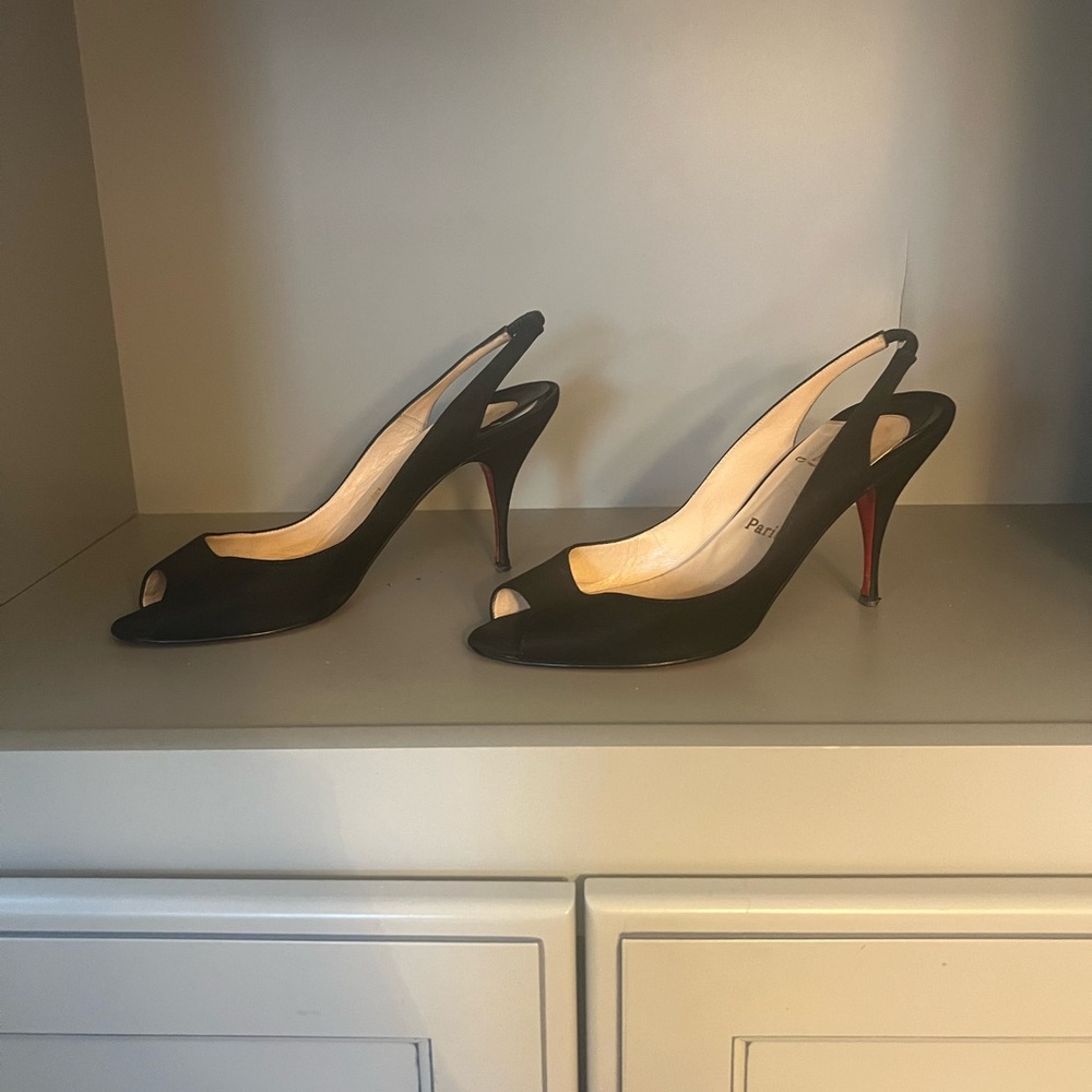 Christian Louboutin peep toe pumps